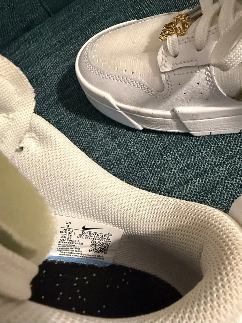 Nike Women’s White and Gold Low-Top Sneakers with Metallic Swoosh